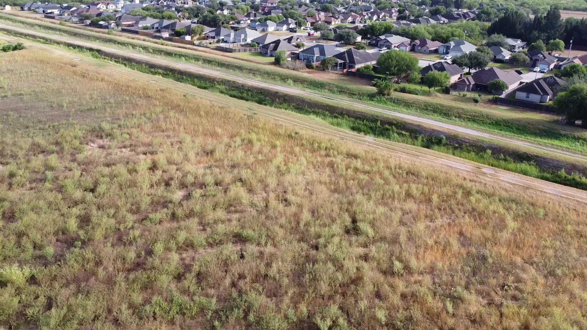 Aerial view of acreage along S Sam Houston Blvd, San Benito TX