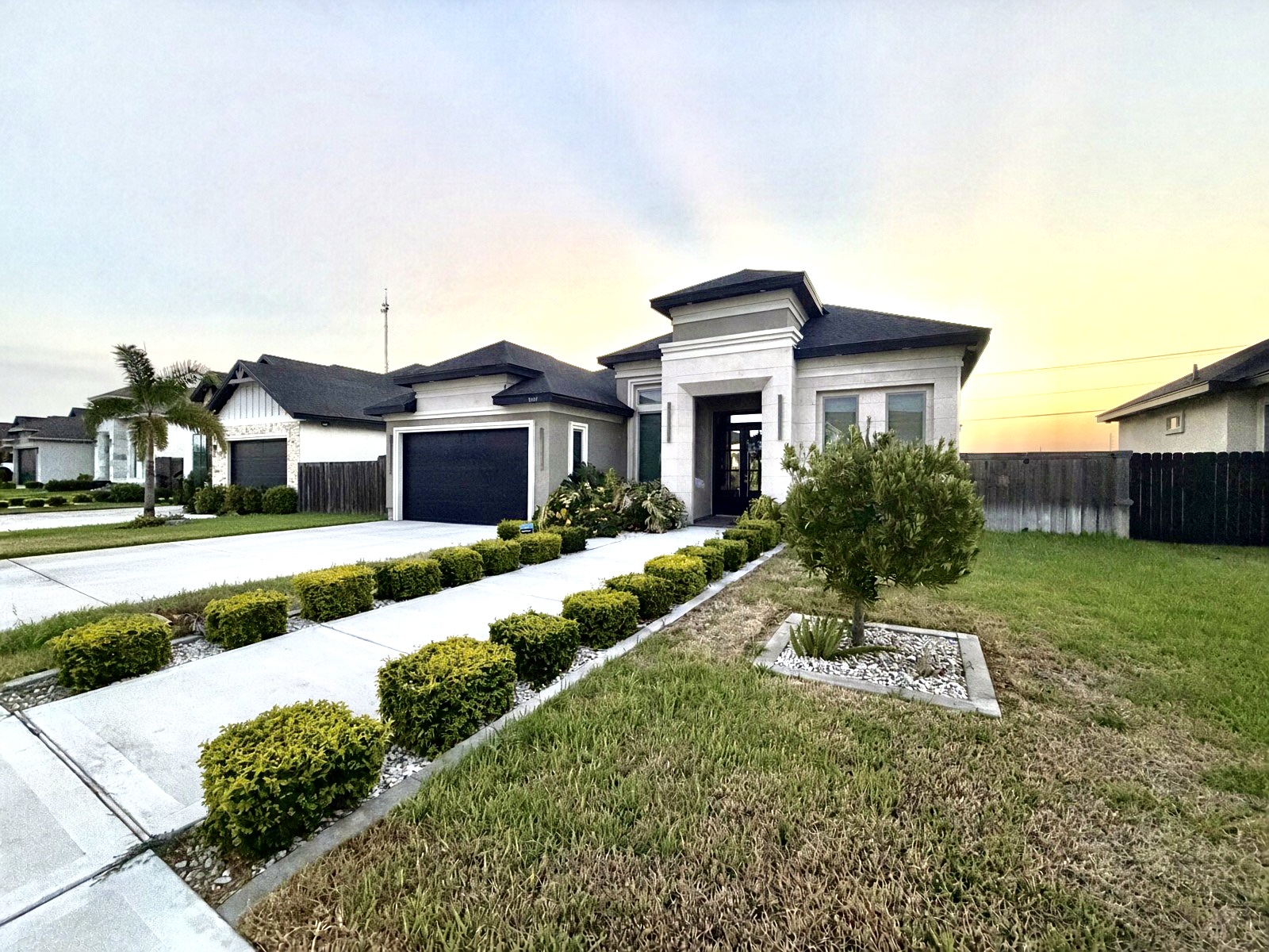 Front exterior of 3009 Silver Oak Ave at dusk, Mission TX