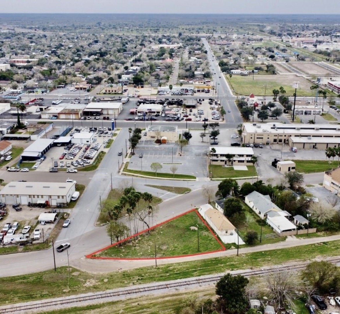 Aerial view of W Jackson Ave corner lots outlined in Harlingen TX